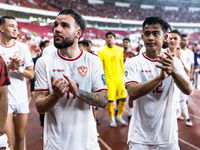 Calvin Verdonk and Arhan Pratama of Indonesia celebrate their victory after the FIFA World Cup Asian 3rd Qualifier Group C match against Sau...