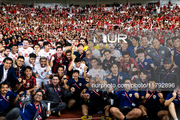 Indonesia players celebrate their victory after the FIFA World Cup Asian 3rd Qualifier Group C match against Saudi Arabia at Gelora Bung Kar...