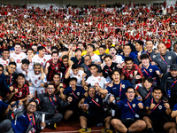 Indonesia players celebrate their victory after the FIFA World Cup Asian 3rd Qualifier Group C match against Saudi Arabia at Gelora Bung Kar...