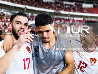 Calvin Verdonk, Ragnar Oratmangoen, and Arhan Pratama of Indonesia celebrate their victory after the FIFA World Cup Asian 3rd Qualifier Grou...