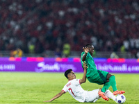 Marselino Ferdinan of Indonesia is in action during the FIFA World Cup Asian 3rd Qualifier Group C match against Saudi Arabia at Gelora Bung...