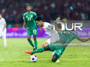 Marselino Ferdinan of Indonesia is in action during the FIFA World Cup Asian 3rd Qualifier Group C match against Saudi Arabia at Gelora Bung...