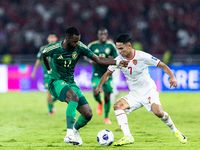 Marselino Ferdinan of Indonesia is in action during the FIFA World Cup Asian 3rd Qualifier Group C match against Saudi Arabia at Gelora Bung...