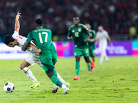 Marselino Ferdinan of Indonesia is in action during the FIFA World Cup Asian 3rd Qualifier Group C match against Saudi Arabia at Gelora Bung...