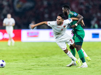 Marselino Ferdinan of Indonesia is in action during the FIFA World Cup Asian 3rd Qualifier Group C match against Saudi Arabia at Gelora Bung...