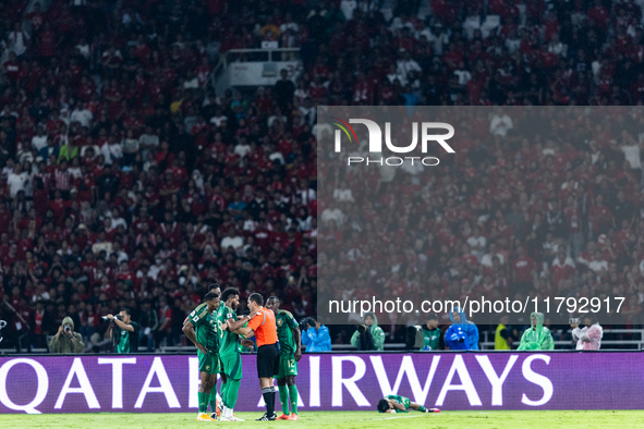 A Saudi Arabia player protests to the referee during the FIFA World Cup Asian 3rd Qualifier Group C match against Indonesia at Gelora Bung K...