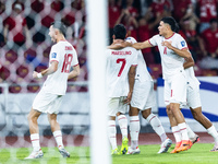 Marselino Ferdinan of Indonesia celebrates scoring their first goal with teammates during the FIFA World Cup Asian 3rd Qualifier Group C mat...