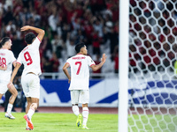 Marselino Ferdinan of Indonesia celebrates scoring their second goal with teammates during the FIFA World Cup Asian 3rd Qualifier Group C ma...