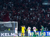 Indonesia players celebrate their victory after the FIFA World Cup Asian 3rd Qualifier Group C match against Saudi Arabia at Gelora Bung Kar...