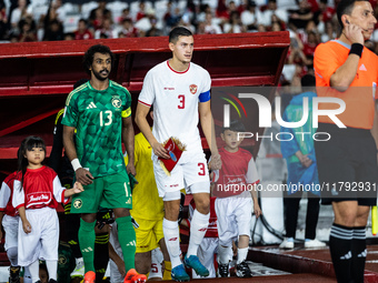 Jay Noah Idzes of Indonesia walks onto the pitch during the FIFA World Cup Asian 3rd Qualifier Group C match against Saudi Arabia at Gelora...