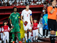 Jay Noah Idzes of Indonesia walks onto the pitch during the FIFA World Cup Asian 3rd Qualifier Group C match against Saudi Arabia at Gelora...