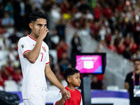 Marselino Ferdinan of Indonesia walks onto the pitch during the FIFA World Cup Asian 3rd Qualifier Group C match against Saudi Arabia at Gel...