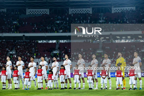 Indonesian players line up during the national anthems before the FIFA World Cup Asian 3rd Qualifier Group C match against Saudi Arabia at G...