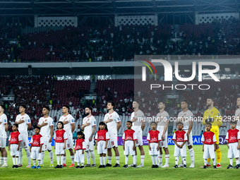 Indonesian players line up during the national anthems before the FIFA World Cup Asian 3rd Qualifier Group C match against Saudi Arabia at G...