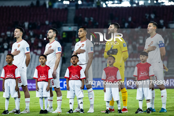 Indonesian players line up during the national anthems before the FIFA World Cup Asian 3rd Qualifier Group C match against Saudi Arabia at G...