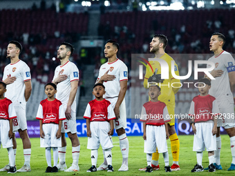 Indonesian players line up during the national anthems before the FIFA World Cup Asian 3rd Qualifier Group C match against Saudi Arabia at G...