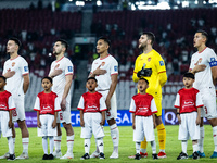 Indonesian players line up during the national anthems before the FIFA World Cup Asian 3rd Qualifier Group C match against Saudi Arabia at G...