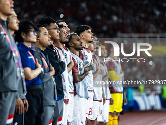 Indonesian players line up during the national anthems before the FIFA World Cup Asian 3rd Qualifier Group C match against Saudi Arabia at G...