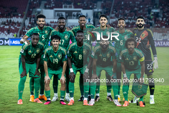 Saudi Arabia players pose for a team group photo before the FIFA World Cup Asian 3rd Qualifier Group C match against Indonesia at Gelora Bun...