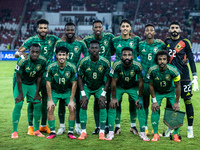 Saudi Arabia players pose for a team group photo before the FIFA World Cup Asian 3rd Qualifier Group C match against Indonesia at Gelora Bun...