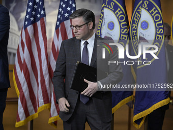 US House Speaker Mike Johnson arrives to speak on immigration policy during a press conference in Washington DC, USA, on November 19, 2024....