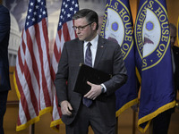 US House Speaker Mike Johnson arrives to speak on immigration policy during a press conference in Washington DC, USA, on November 19, 2024....