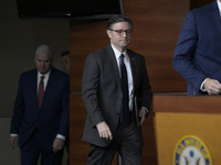 US House Speaker Mike Johnson arrives to speak on immigration policy during a press conference in Washington DC, USA, on November 19, 2024....