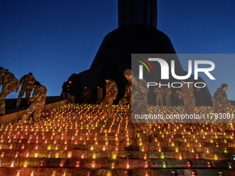 The action ''Light a Candle'' involves lighting 1,000 candles on the 1,000th day of the full-scale invasion of Russia into Ukraine in the sq...