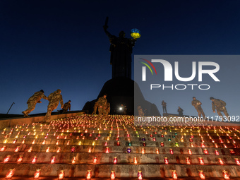 The action ''Light a Candle'' involves lighting 1,000 candles on the 1,000th day of the full-scale invasion of Russia into Ukraine in the sq...