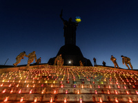 The action ''Light a Candle'' involves lighting 1,000 candles on the 1,000th day of the full-scale invasion of Russia into Ukraine in the sq...