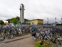 In Venlo, Netherlands, on July 28, 2023, Venlo Train Station presents a typical Dutch cycling scene with hundreds of bicycles tightly packed...