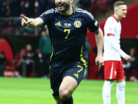 John McGinn celebrates the goal during UEFA Nations League match Poland - Scotland at National Stadium in Warsaw, Poland on November 18, 202...