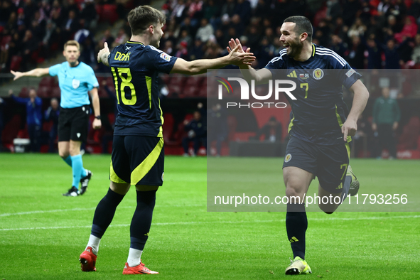 Ben Doak and John McGinn celebrate the goal during UEFA Nations League match Poland - Scotland at National Stadium in Warsaw, Poland on Nove...