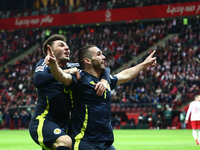 Ben Doak and John McGinn celebrate the goal during UEFA Nations League match Poland - Scotland at National Stadium in Warsaw, Poland on Nove...