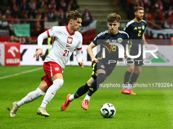 Nicola Zalewski and Ben Doak during UEFA Nations League match Poland - Scotland at National Stadium in Warsaw, Poland on November 18, 2024....