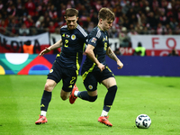 Anthony Ralston and Ben Doak during UEFA Nations League match Poland - Scotland at National Stadium in Warsaw, Poland on November 18, 2024....