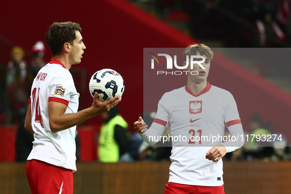 Jakub Kiwior and Nicola Zalewski during UEFA Nations League match Poland - Scotland at National Stadium in Warsaw, Poland on November 18, 20...