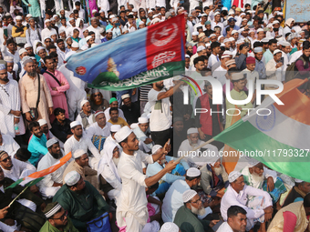 Indian Muslims shout slogans during a protest against the Anti-Waqf Amendment Bill in Kolkata, India, on November 19, 2024. More than 60 tho...