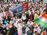 Indian Muslims shout slogans during a protest against the Anti-Waqf Amendment Bill in Kolkata, India, on November 19, 2024. More than 60 tho...