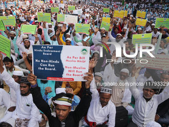 Indian Muslims shout slogans during a protest against the Anti-Waqf Amendment Bill in Kolkata, India, on November 19, 2024. More than 60 tho...