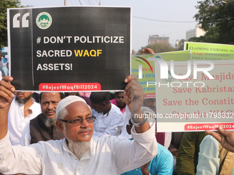 Indian Muslims shout slogans during a protest against the Anti-Waqf Amendment Bill in Kolkata, India, on November 19, 2024. More than 60 tho...