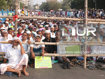 Indian Muslims shout slogans during a protest against the Anti-Waqf Amendment Bill in Kolkata, India, on November 19, 2024. More than 60 tho...