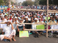 Indian Muslims shout slogans during a protest against the Anti-Waqf Amendment Bill in Kolkata, India, on November 19, 2024. More than 60 tho...