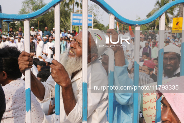 Indian Muslims shout slogans during a protest against the Anti-Waqf Amendment Bill in Kolkata, India, on November 19, 2024. More than 60 tho...