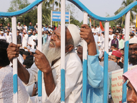 Indian Muslims shout slogans during a protest against the Anti-Waqf Amendment Bill in Kolkata, India, on November 19, 2024. More than 60 tho...