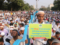 Indian Muslims shout slogans during a protest against the Anti-Waqf Amendment Bill in Kolkata, India, on November 19, 2024. More than 60 tho...