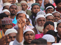 Indian Muslims shout slogans during a protest against the Anti-Waqf Amendment Bill in Kolkata, India, on November 19, 2024. More than 60 tho...