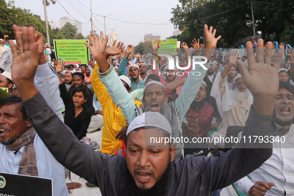 Indian Muslims shout slogans during a protest against the Anti-Waqf Amendment Bill in Kolkata, India, on November 19, 2024. More than 60 tho...