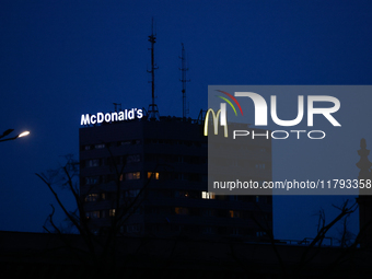 McDonald's logo is seen on the building in Warsaw, Poland on November 18, 2024. (