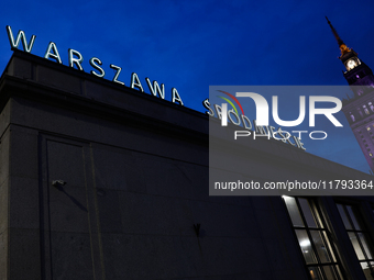 A view of of the Warszawa Srodmiescie railway station buiilding and the Palace of Culture and Science in Warsaw, Poland on November 18, 2024...